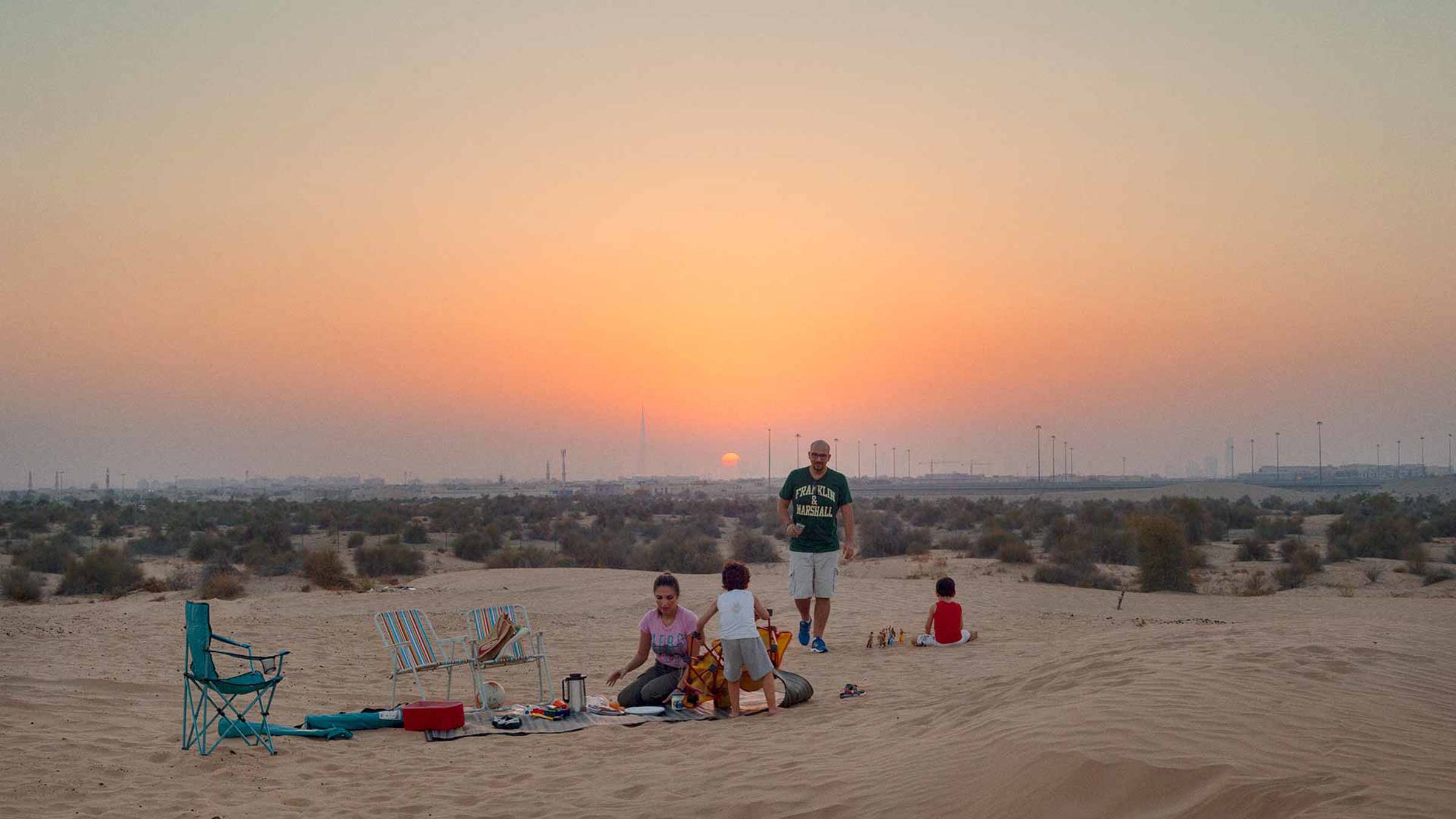A family having a picnic in a desert