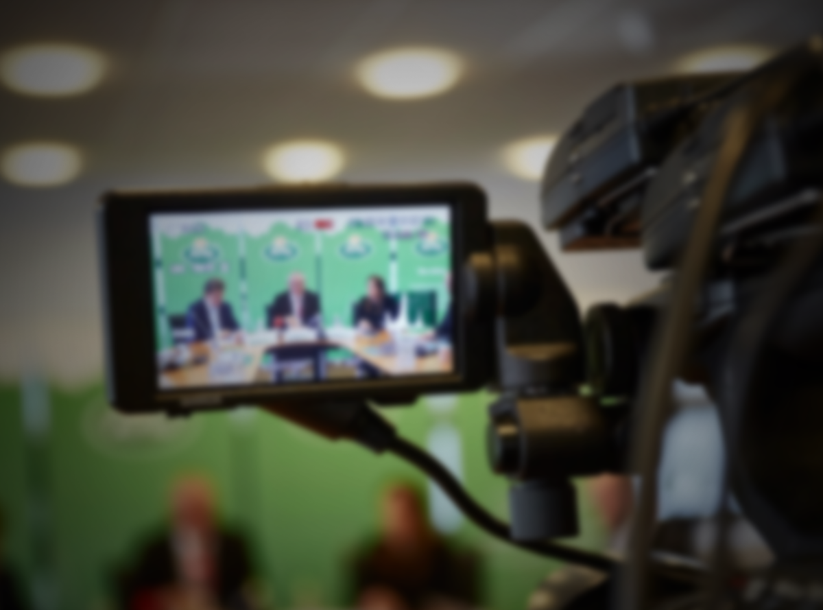 An Arla conference seen through the viewfinder of a video camera