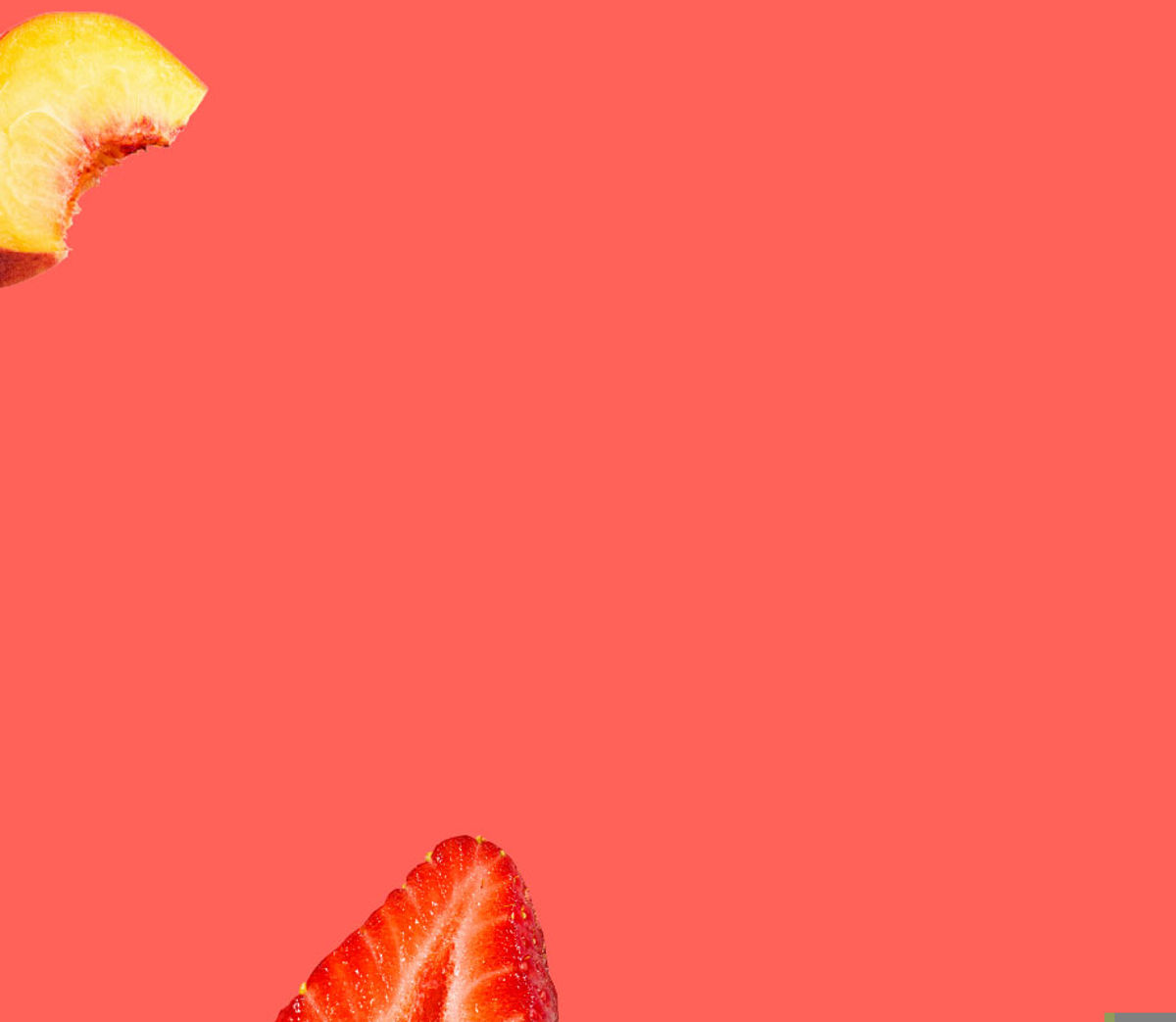 A peach slice and a strawberry half on a red background