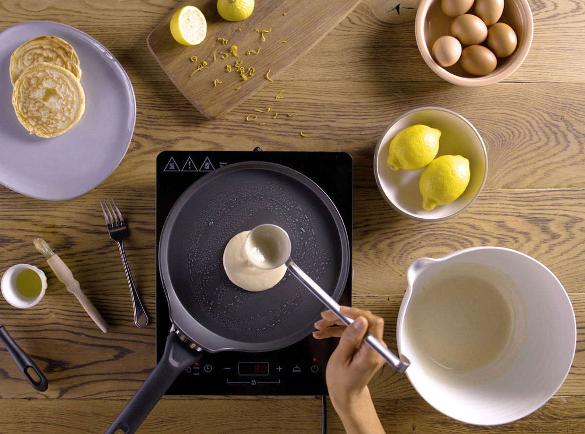 pouring batter into a pan