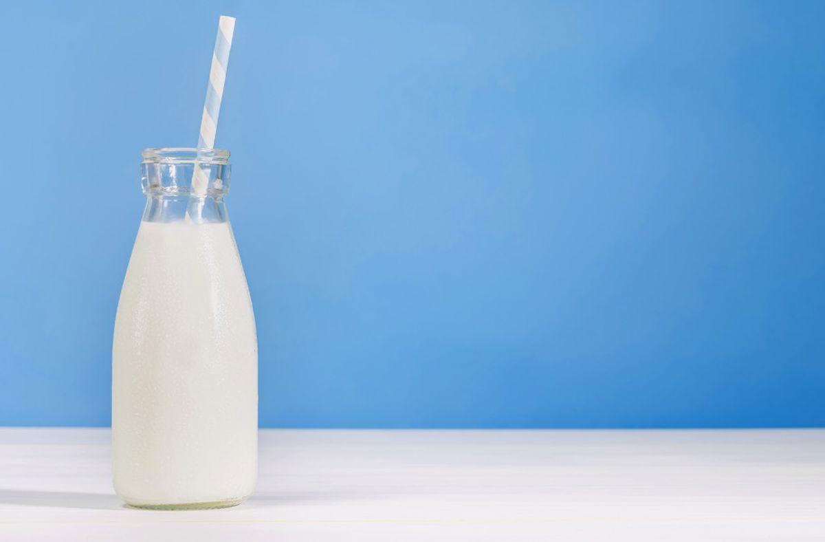 Milk bottle with straw