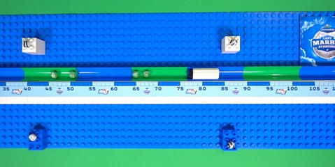 A narrow marble track for block pushing