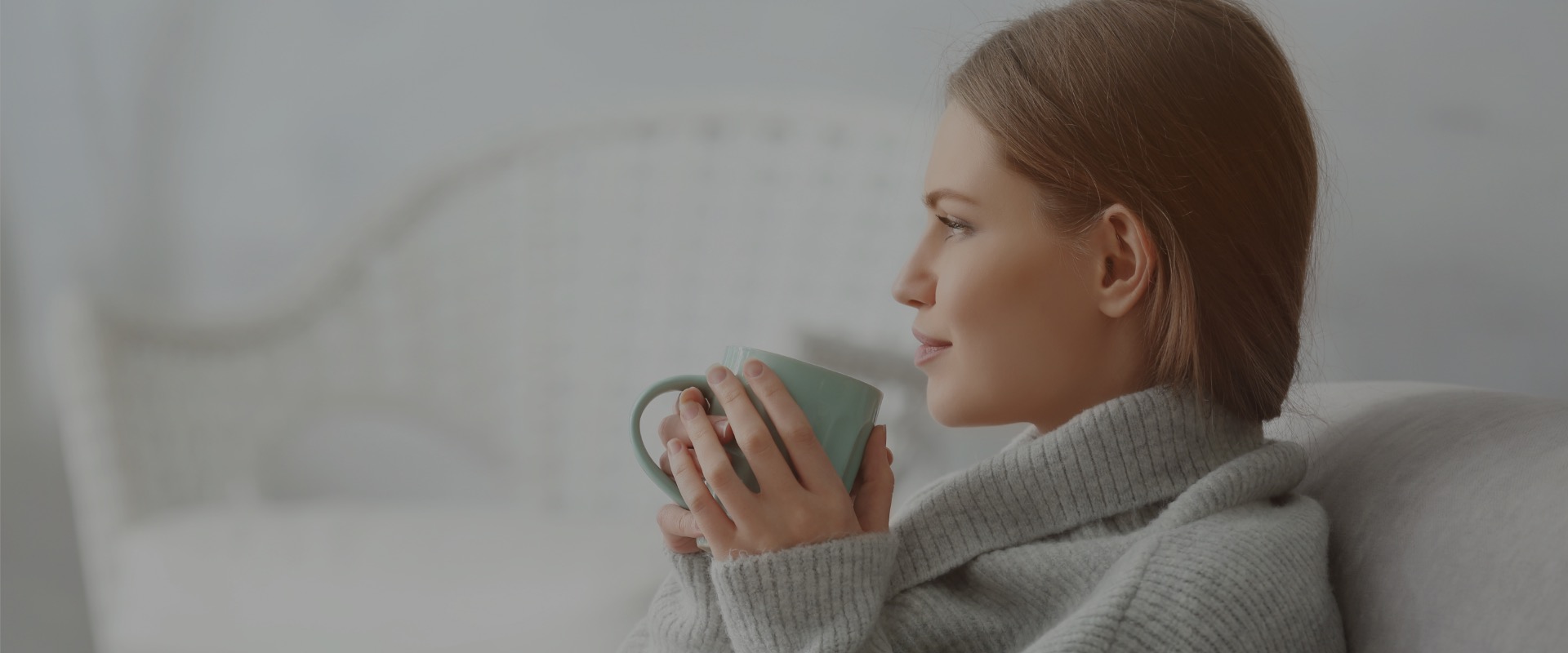 Woman drinking from a mug