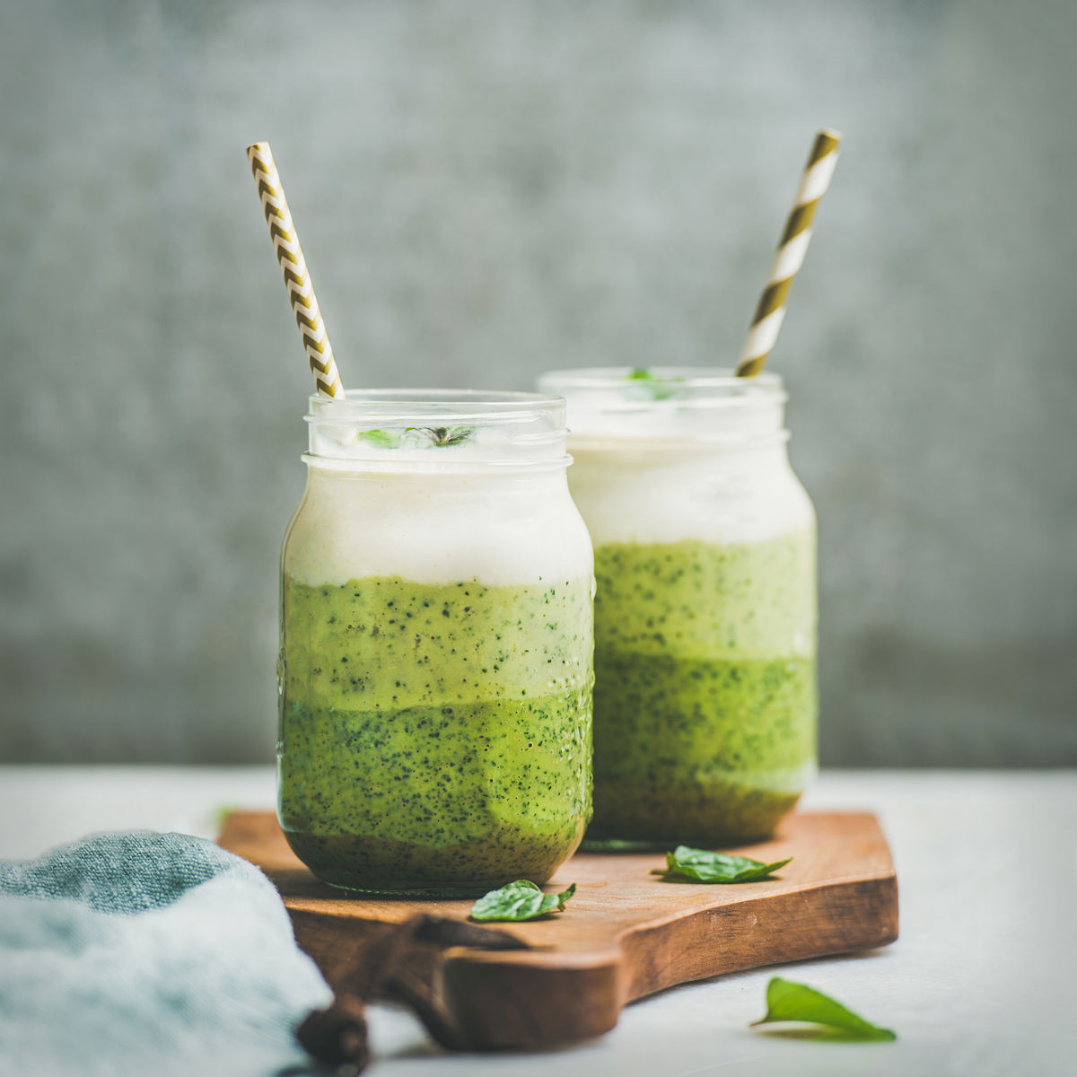 Two jars of green smoothie