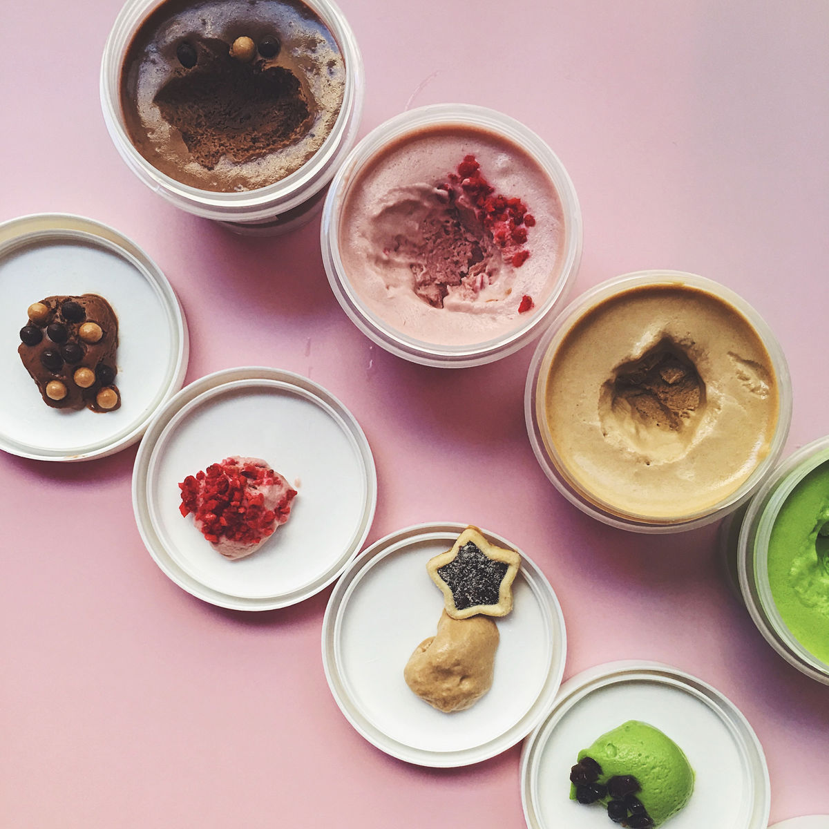 Tubs of ice cream and their scoops