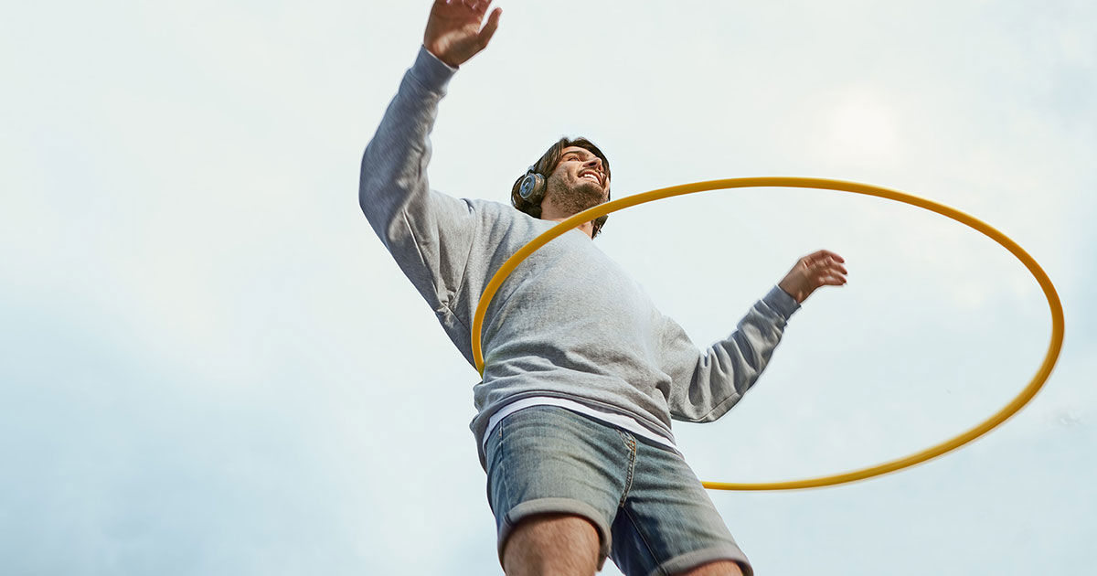 Man hula hooping