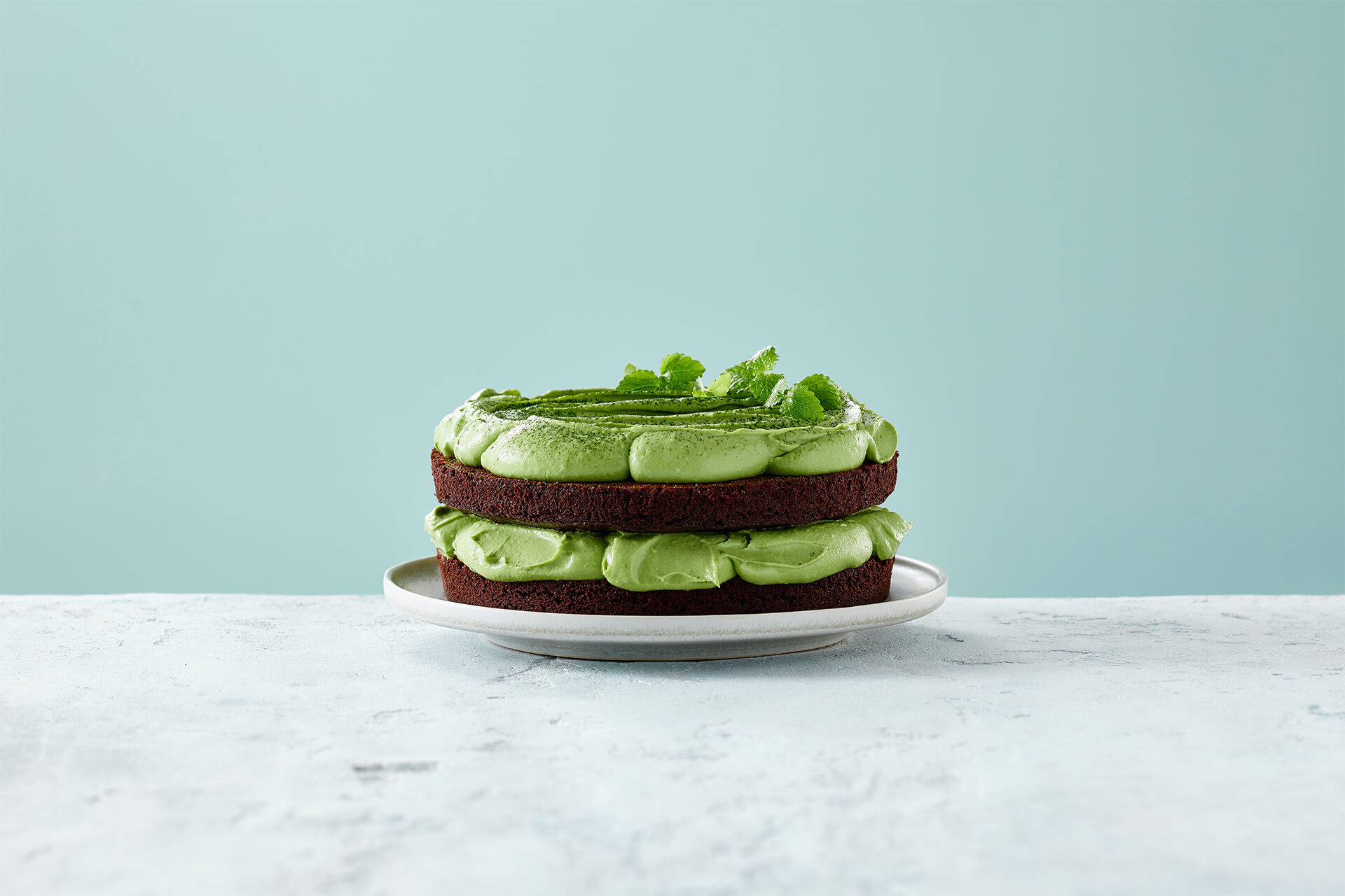 Chocolate cake with avocado and matcha tea
