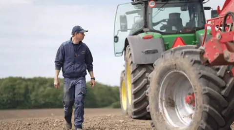 Farmer with a tractor