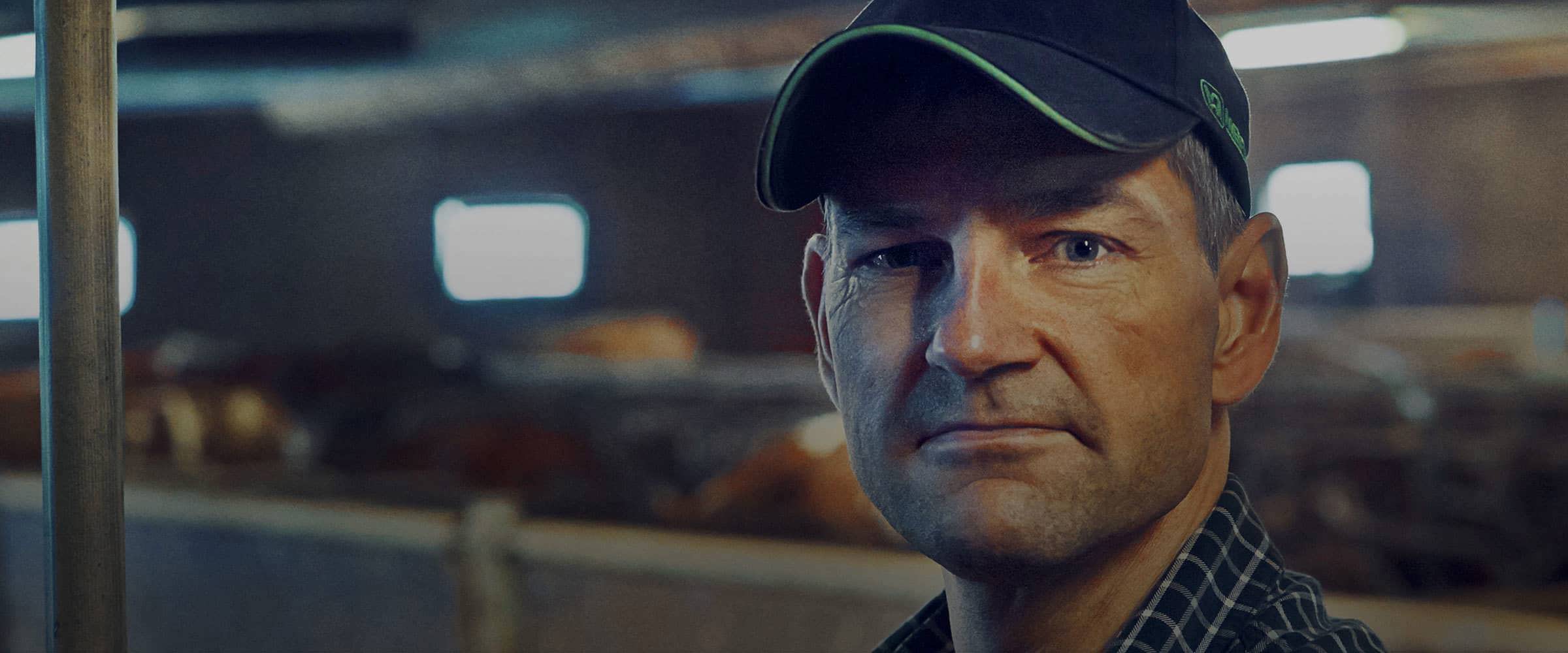 Close up portrait of a farmer inside his dairy